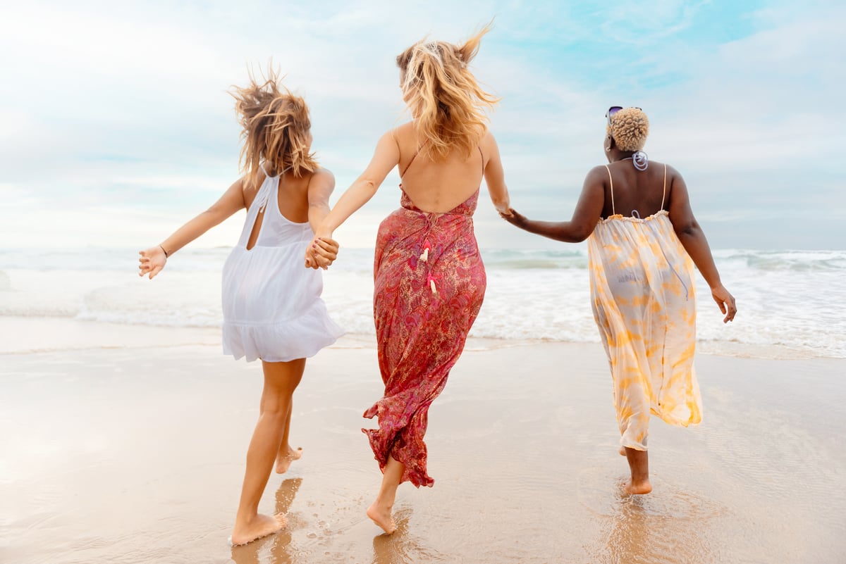 multiracial-group-of-girls-on-the-beach-2024-03-15-18-40-48-utc